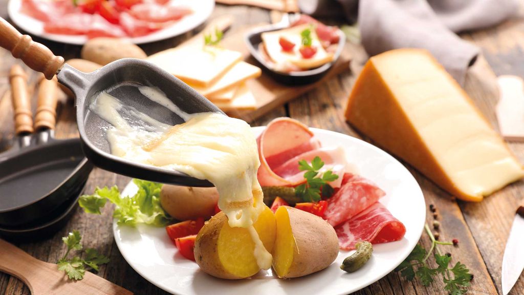 Schweiz Genfer Seenzauber - Raclette, Tartifl ette, Fondue o. ä.