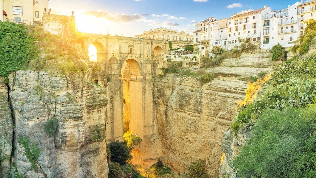 Spanien Das Beste aus Andalusien - Puente Nuevo Brücke in Ronda bei Sonnenuntergang