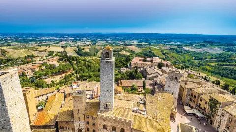 6661_Kurlaub-in-der-Toskana_content_1920x1080px_blick_auf_die_mittelalterliche_stadt_san_gimignano-placeholder