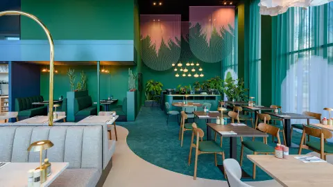 Restaurant mit grünem design im Hotel ibis Styles Rotterdam ahoy-placeholder